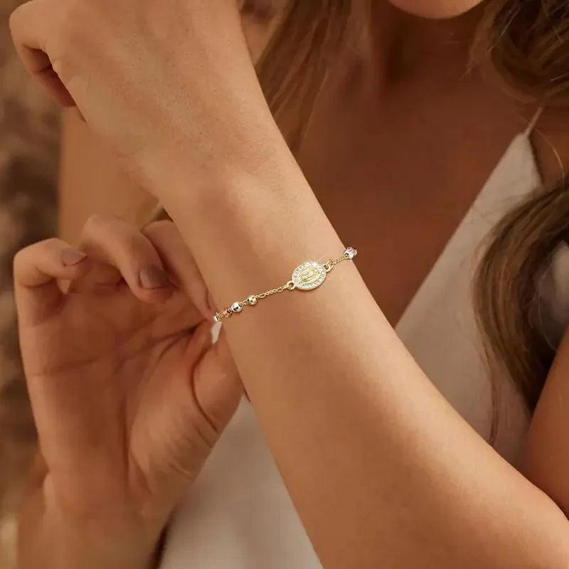 PULSERA ROSARIO CON CRUCIFIJO ETERNA FE™
