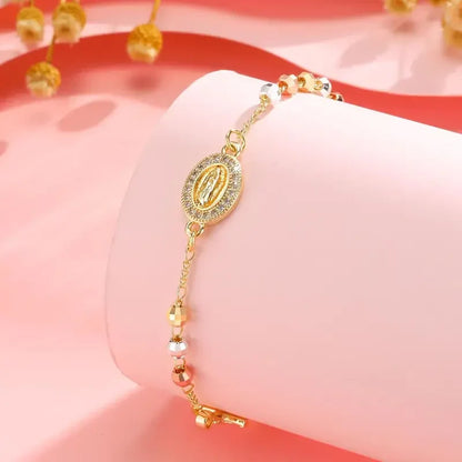 PULSERA ROSARIO CON CRUCIFIJO ETERNA FE™